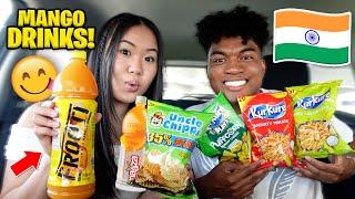 COUPLES TRY INDIAN SNACKS FOR THE FIRST TIME! (KURKURE, FROOTI, UNCLE CHIPPS & MAAZA) *PART 8*