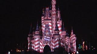 Christmas projections on Cinderella Castle during Celebrate the Magic finale at Walt Disney World