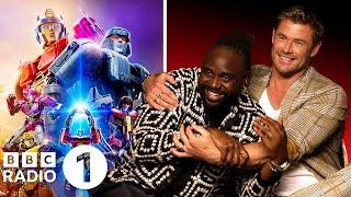 "Gimme a hug!" Chris Hemsworth and Brian Tyree Henry on fun fan interactions and Transformers One