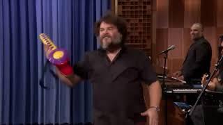 Jack black plays a toy saxophone