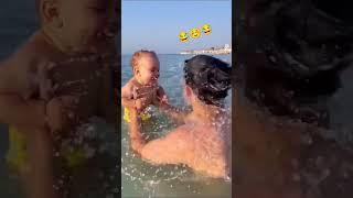 Baby laughing at the beach with dad #shorts #fyp #cute #viral