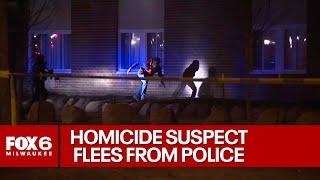 Milwaukee police standoff: homicide suspect jumps from window, arrested | FOX6 News Milwaukee