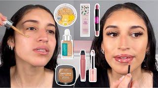 TESTING OUT BRAND NEW DRUGSTORE MAKEUP | first impressions | Sandy Carina