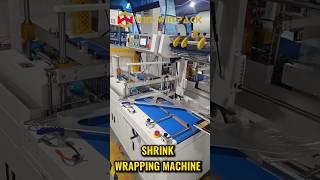 A live demonstration of a fully automatic sealing and shrinking machine for packaging books #shrots