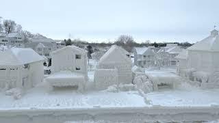 Incredible drone footage shows thick layer of ice covering houses on Lake Erie