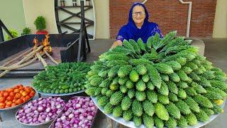 Karela Cooked In Our Traditional Style | Bitter Gourd Recipe | Village Cooking Recipe