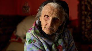 Difficult old age of a 96 year old grandmother with her son in a high mountain village