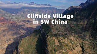 Vlogger makes "cliffside village" famous in SW China 悬崖村的网红