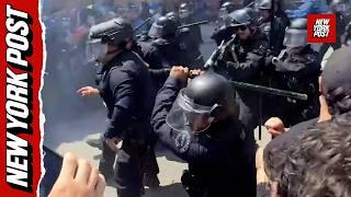 LAPD beats back anti-ICE protesters with batons and rubber bullets