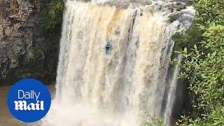 Australian daredevil plunges over waterfall in kayak - Daily Mail