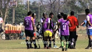 Punjabi boys ready to start the game of hockey at Rural Olympics