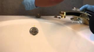 Plumber taking bathtub overflow cover off - HD Stock Footage