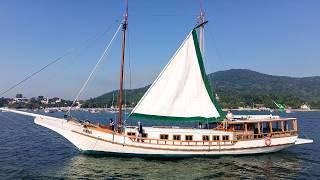 Hoisting the SAILS on our restored BOAT — Sailing Yabá 216