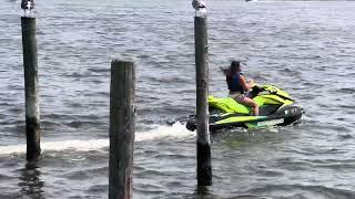 Jet Ski orders a drink from a bar