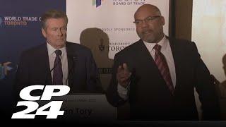 Mayor John Tory interrupted during debate