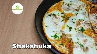 Shakshuka recipe in indian style/poached eggs in tomato sauce/Sharadhini's kitchen