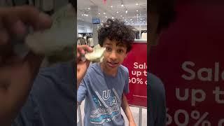 boys play while girls shop at Mall