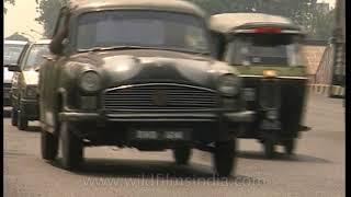 Maruti 800 and Ambassador cars on Delhi roads - archival