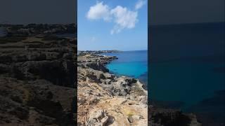 Standing on the Edge of Paradise #island #travelmoments #shortsvideo #naturelovers #epicmoments