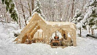 hot tentInstalling a large wood stove in a long-term snow camp with inflatable tents