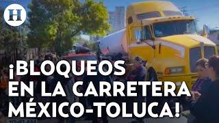 ¡Sin paso en la México-Toluca! Vecinos bloquean ambos sentidos de la carretera; alternativas viales