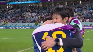 Japan manager Hajime Moriyasu consoles an emotional Hiroki Sakai after Japan's knockout stage exit