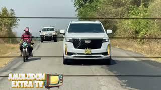 THE GREAT OONI OF IFE STEPS OUT IN EXPENSIVE CADILLAC.