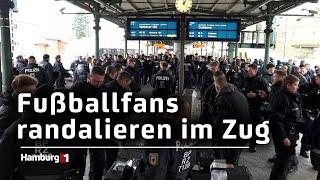 Bahn verwüstet: 500 Fußballfans randalieren im Zug