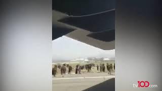 Taliban'dan kaçmak için uçağın kanadına binen Afgan tarafından çekilen görüntüler