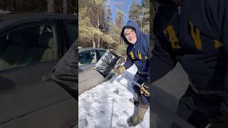 This car is buried in ice. Can I use a regular snow shovel to dig it out? I think not.