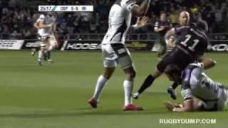 Shane Williams hurdles Topsy Ojo