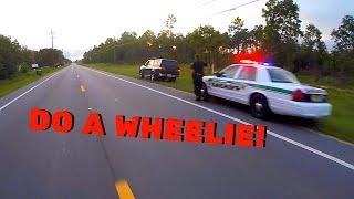 WHEELIE BY THE COPS?