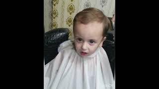 Taha Youzarsif crying  during hair cut at the Hair Saloon