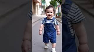 "Adorable Baby’s First Steps on the Street: A Moment to Remember" "#cute #baby  #BabyWalks #shorts