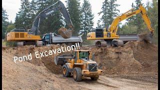 Excavators At Work, Digging And Loading Dump Trucks For Earth Work Excavation Project