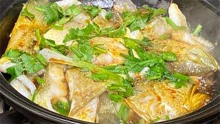 The method of yellow croaker in black bean sauce, the fish is tender and delicious, so delicious