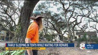 'I used all of my savings': Pasco family waits on FEMA, lives in tents on front lawn