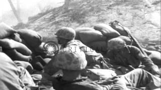 US Marines in sandbag bunker fire at Japanese position, Tarawa Island in Pacific ...HD Stock Footage