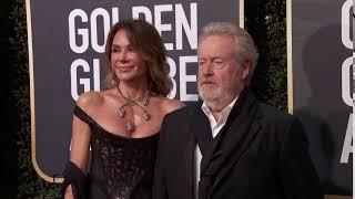 Giannina Facio & Ridley Scott Golden Globe Awards Fashion Arrivals (2018) | ScreenSlam