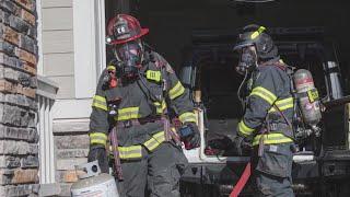 Firefighters in garage during explosion