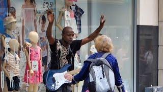 DISABLED WOMAN ATTACKS  BUSKER IN LIVERPOOL.  The people of Liverpool support this busker.