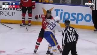 Brendan Dillon hits JJ Peterka and Alex Tuch retaliates against Dillon