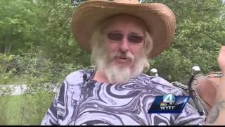 Upstate man traveling the country in a mule-driven covered wagon