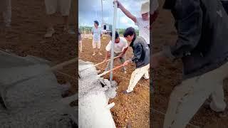 the process of installing poles with reinforcement using a mixture of cement and iron #shorts