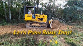 Pushing out Stumps, Leveling Ditches and Reclaiming some Land.