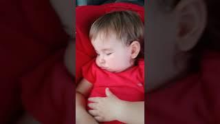 Sleeping baby at car