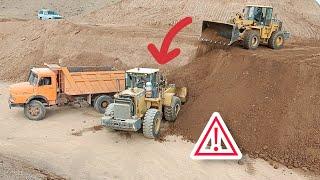 Cooperation of heavy machinery, excavators and loaders