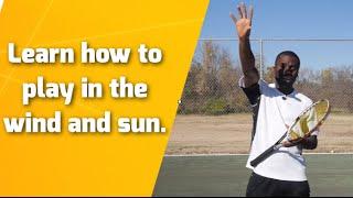 Tennis Lesson: Learn how to play in the wind and sun.