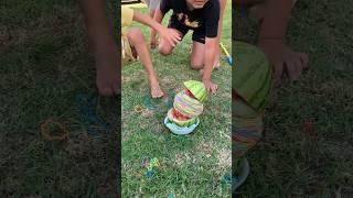 We used 500+ rubber bands to EXPLODE A WATERMELONScience Experiment for Kids #scienceforkids