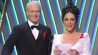 Elizabeth Taylor & Paul Newman reunite to present Best Picture at the 64th Academy Awards in 1992.